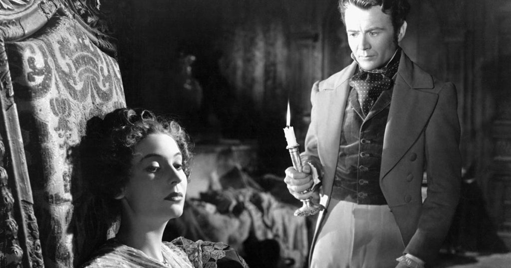 John Mills as Pip stands over Valerie Hobson as Estella in David Lean's Great Expectations (1946)