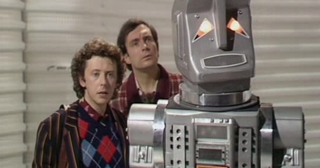 Simon Jones as Arthur Dent and Mark Wing-Davey as Zaphod Beeblebrox in the 1981 BBC TV adaptation of The Hitchhiker's Guide to the Galaxy