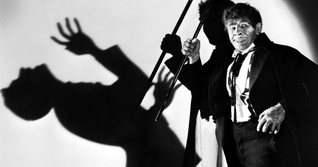 Fredric March raises a cane as Edward Hyde in Dr. Jekyll and Mr. Hyde (1931)